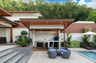 Outdoor swimming pool with counter bar in pool terrace